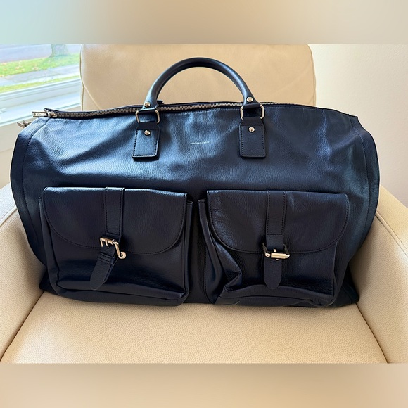Hook & Albert Garmin Duffle in blue leather.